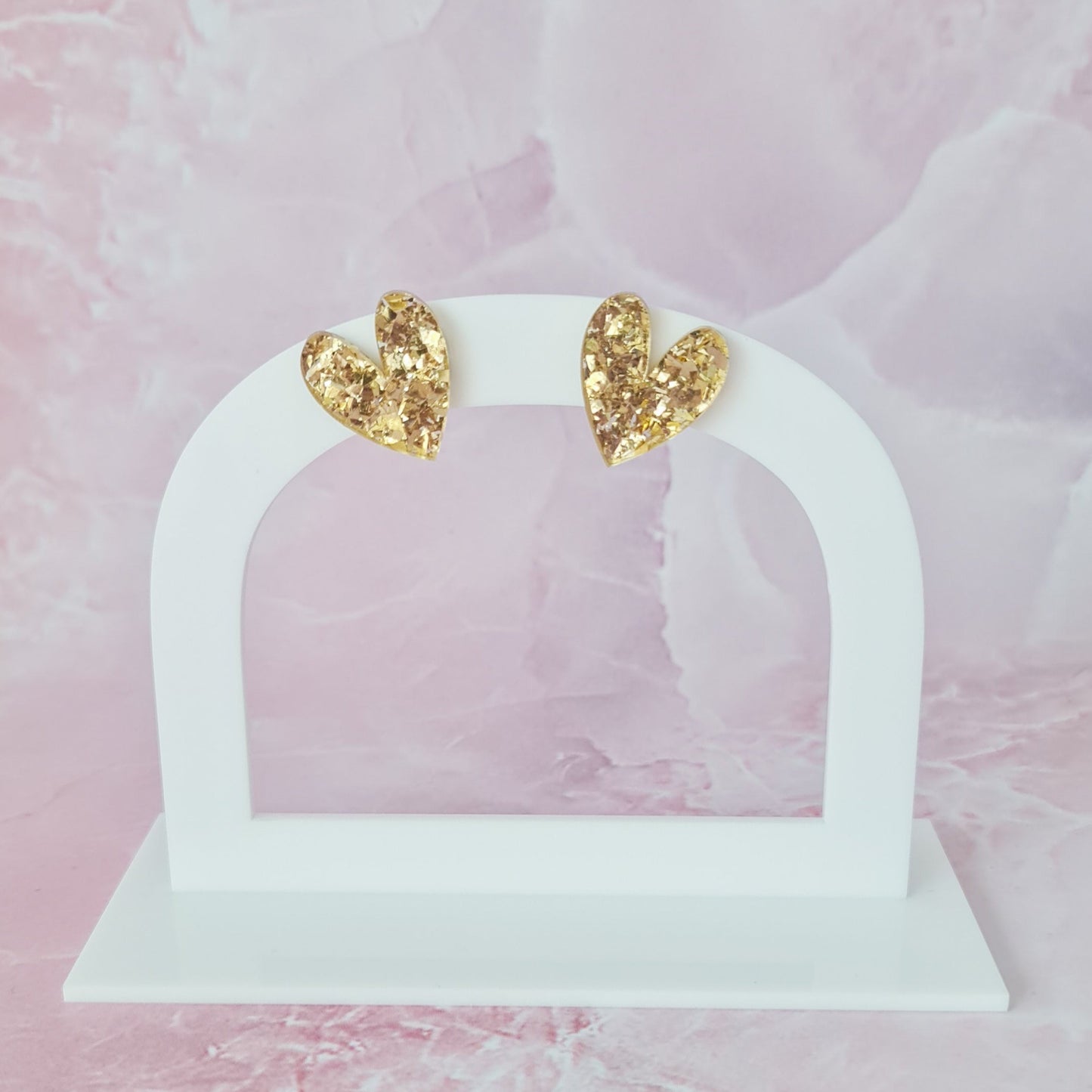 Gold heart stud earrings