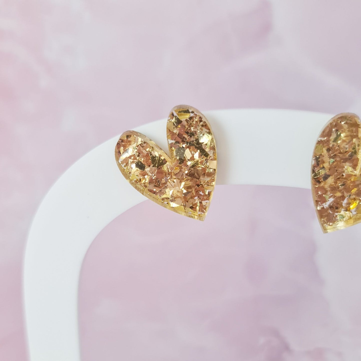 Gold heart stud earrings